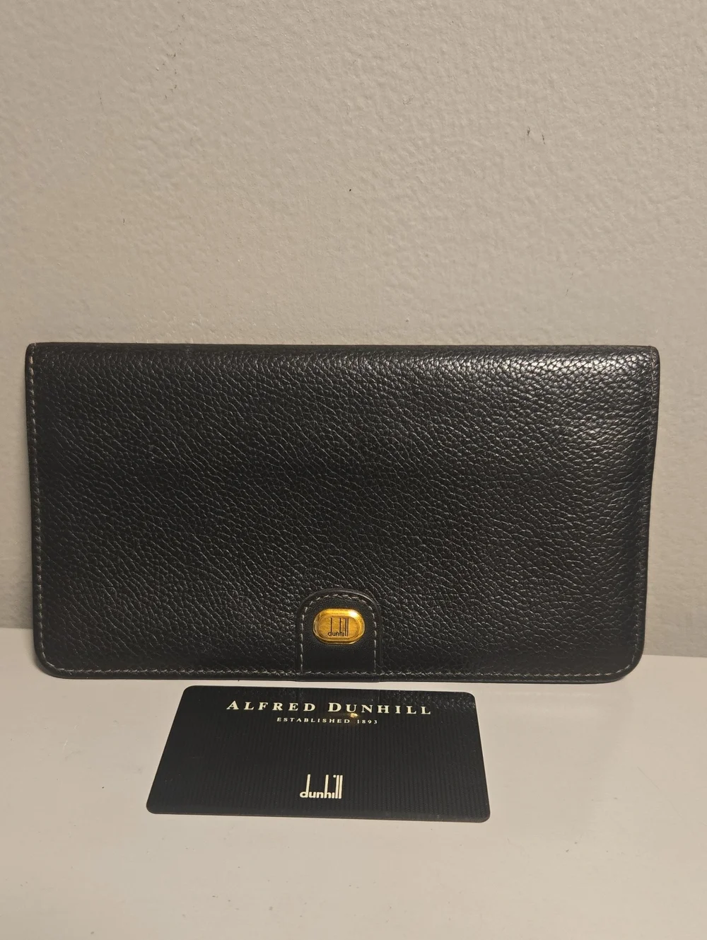 Dunhill Black Pebble Leather Continental Wallet with Gold Accent